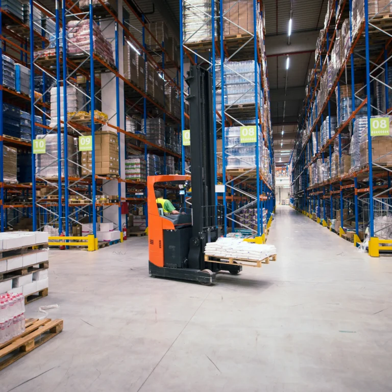 industrial-building-large-warehouse-interior-with-forklift-palette-with-goods-shelves